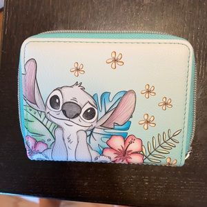 Disney wallet with stitch on it. Never used